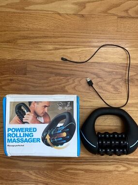 Powered rolling massager